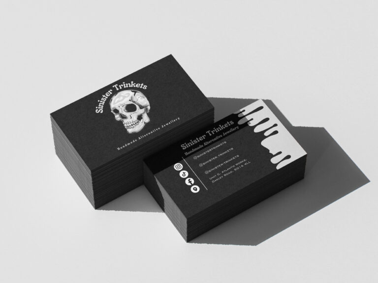 This project included brand identity development for an alternative jewelry company targeting the gothic/alternative consumers. The client required a cohesive visual system for both social media presence and retail application that would authentically resonate with their niche market.
Central to the identity is a meticulously hand-illustrated chrome-effect skull motif that embodies the brand's distinctive aesthetic. The business cards presented here demonstrate the strategic application of this core design element, with careful attention to material selection and finishing techniques that reinforce the premium yet alternative positioning of the brand.